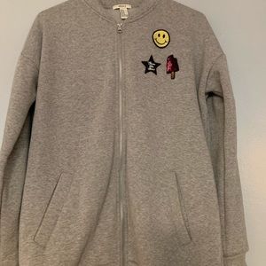 Grey jacket with patches